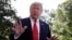 President Donald Trump talks with reporters before departing on Marine One, May 30, 2019, in Washington.