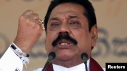 Sri Lanka's former president Mahinda Rajapaksa, who is contesting in the upcoming general election, speaks during the launch ceremony of his manifesto, in Colombo, July 28, 2015.