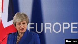 PM Inggris Theresa May menggelar konferensi pers usai pertemuan luar biasa dengan para pemimpin Uni Eropa untuk membahas Brexit, di Brussels, Belgia, 11 April 2019.