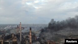 Дим на "Азовсталі", 11 березня 2022 року Полк Азов/Handout via REUTERS