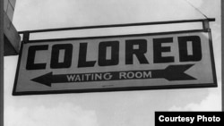 A sign at the Greyhound bus station in Rome, Georgia in September 1943. (Image courtesy of Esther Bubley via the Library of Congress)