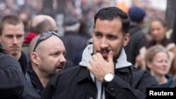 FILE - Alexandre Benalla, French presidential aide, is seen during the May Day labor union rally in Paris, May 1, 2018. 