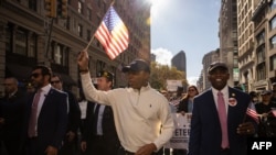 New York City Mayor Eric Adams marches during the annual Veterans Day Parade in New York on November 11, 2024. 