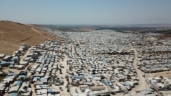 FILE - A tent city for the internally displaced is seen in Idlib province, northwestern Syria, July 24, 2020.