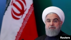 FILE - Iranian President Hassan Rouhani attends a meeting with Muslim leaders and scholars in Hyderabad, India, Feb. 15, 2018.