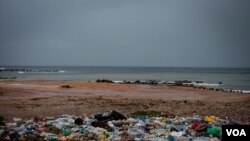 An uncontained garbage dump lies next to Virage Beach in Dakar, Senegal. (A. Hammerschlag/VOA)