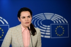FILE - Belarusian opposition leader Sviatlana Tsikhanouskaya speaks during a news conference in Brussels, Belgium, Sept. 21, 2020.