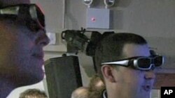 In general, the reaction to 3D has been enthusiastic. For the moment, the 3D sets come with one pair of glasses. Extra ones cost about $150 each.