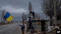 Українські діти у Херсоні після звільнення міста від російської окупації. 23 листопада 2022 р. АP Photo/Bernat Armangue