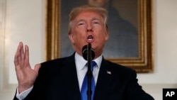 FILE - President Donald Trump makes a statement on Iran policy in the Diplomatic Reception Room of the White House in Washington, Oct. 13, 2017.