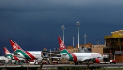 FILE - Kenya Airways planes are seen parked during a pilots strike organized by Kenya Airline Pilots Association (KALPA) at the Jomo Kenyatta International airport near Nairobi, Apr. 28, 2016.