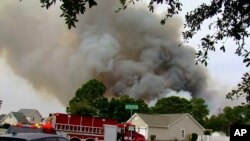 Ma’aikatan Suna Kokarin Shawo Kan Gobarar A Dajin Carolina