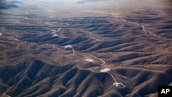 Aerial photo taken Nov. 13, 2023, by Archaeology Southwest shows new access roads and tower pad sites west of the San Pedro River in Arizona. 