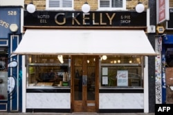 A picture shows the facade of the traditional pie and mash shop G Kelly in east London, Feb. 19, 2025.