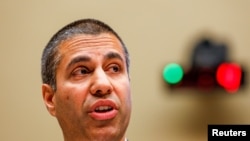FILE - FCC Chairman Ajit Pai testifies before a House Energy and Commerce communications and technology subcommittee hearing on oversight of the Federal Communications Commission on Capitol Hill in Washington, Dec. 5, 2019.