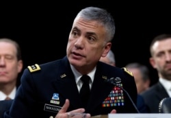 FILE - National Security Agency Director Gen. Paul Nakasone testifies before the Senate Intelligence Committee on Capitol Hill in Washington, Jan. 29, 2019.