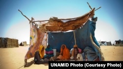 Displaced persons such as these from East Darfur, who are at a camp in Darfur, would benefit from increased aid that UN official Valerie Amos pledged to call for.