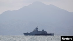A Malaysian navy vessel patrols waters near Langkawi island, May 17, 2015. 