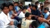 Ethnic Rohingya asylum seekers who were rescued from their boat off Sumatra island sit inside a police truck to be taken to a detention center in Lhokseumawe, Aceh province, Indonesia, February 27, 2013. 