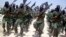 FILE - Al-Shabab fighters conduct exercises on the outskirts of Mogadishu, Somalia, Feb. 17, 2011.
The U.S. military said it conducted an airstrike Dec. 15, 2018, near Gandarhse, south of Mogadishu, that killed at least eight al-Shabab militants.