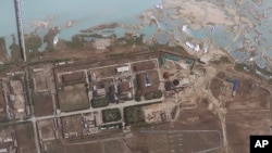 FILE - Satellite image provided by GeoEye shows the area around the Yongbyon nuclear facility in Yongbyon, North Korea. 