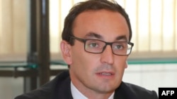 FILE - Then-secretary of state for industry's cabinet director Thomas Cazenave is seen before a meeting with trade union representatives at the Economy Ministry in Paris, France, Sept. 13, 2016.