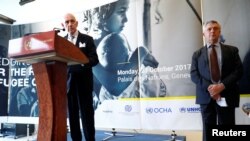 William Lacy Swing, IOM director-general, addresses a news conference next to Filippo Grandi, High Commissioner for Refugees, after the morning session of the Pledging Conference for Rohingya Refugee Crisis in Bangladesh at the UN in Geneva, Switzerland, Oct. 23, 2017.