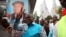 FILE - Felix Tshisekedi, leader of the Democratic Republic of Congo's opposition alliance known as the Rassemblement de l’opposition Congolaise, gestures to his supporters in the Limete Municipality of the DRC's capital Kinshasa, April 24, 2017. 