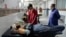FILE - Injured men receive treatment at a hospital in Quetta, Pakistan, Oct. 11, 2024, following Thursday attack by gunmen in Balochistan province.