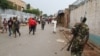 FILE - A soldier patrols the streets after a grenade attack in Burundi's capital, Bujumbura, Feb. 3, 2016. Burundi has been plagued by violence since President Pierre Nkurunziza ran for a controversial third term last year.