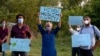 Members of a civil society group hold a demonstration demanding the government allow the construction of a Hindu temple, in Islamabad, Pakistan, July 8, 2020. 