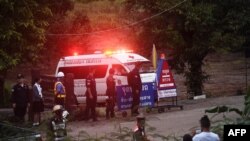 An ambulance leaves the Tham Luang cave area after divers evacuated some of the 12 boys and their coach trapped at the cave in Khun Nam Nang Non Forest Park in the Mae Sai district of Chiang Rai province on July 8, 2018. (AFP PHOTO / LILLIAN SUWANRUMPHA)