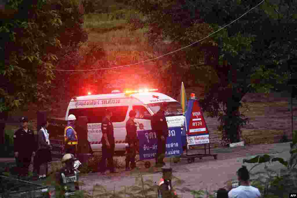 An ambulance leaves the Tham Luang cave area after divers evacuated some of the 12 boys and their coach trapped at the cave in Khun Nam Nang Non Forest Park in the Mae Sai district of Chiang Rai province, July 8, 2018.