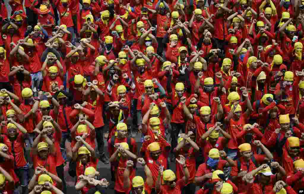 Indonesian workers shout slogans during a May Day rally in Jakarta, Indonesia, May 1, 2016. Thousands of workers urged the government to raise minimum wages and improve working conditions.