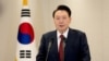 FILE PHOTO: South Korean President Yoon Suk Yeol delivers an address to the nation at the Presidential Office in Seoul