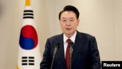 FILE PHOTO: South Korean President Yoon Suk Yeol delivers an address to the nation at the Presidential Office in Seoul