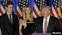 FILE - Donald Trump speaks as his son-in-law Jared Kushner and his daughter Ivanka listen at a campaign event at the Trump National Golf Club Westchester in Briarcliff Manor, New York, June 7, 2016. 