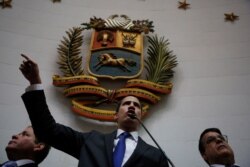 Opposition leader Juan Guaido speaks at the National Assembly in Caracas, Venezuela, Jan. 7, 2020. Guaidó and lawmakers who back him, pushed their way into the legislative building on Tuesday.