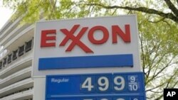 Prices posted at a US gasoline station, April 20, 2011