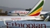 FILE - Ethiopian Airlines planes are seen in on the tarmac at the Bole International Airport in Addis Ababa, Ethiopia, April 7, 2020. 