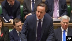 FILE - British Prime Minister David Cameron, shown speaking in the House of Commons in London in December, wants to ensure that any country not in the European Union does not face discrimination from member states. 