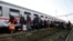 People board a train at the station in Sid, about 100 km west from Belgrade, Serbia, Nov. 3, 2015. 