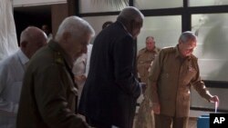 FILE - In this Dec. 27, 2016 file photo, Cuba's President Raul Castro casts his vote to elect a new member of the state council, the biannual legislative session at the National Assembly in Havana, Cuba. 