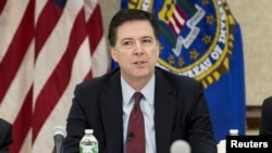 FILE - FBI Director James B. Comey speaks during a news conference in Washington, D.C., March 25, 2015. 