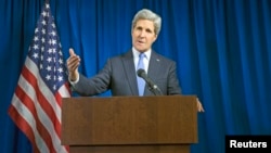 U.S. Secretary of State John Kerry delivers remarks during a news conference at the U.S. Embassy in London, Dec. 16, 2014.