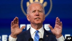 President-elect Joe Biden speaks about the COVID-19 pandemic during an event at The Queen theater, Thursday, Jan. 14, 2021, in Wilmington, Del. (AP Photo/Matt Slocum)