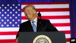 President Donald Trump pauses while speaking about tax reform at the Farm Bureau Building at the Indiana State Fairgrounds, Sept. 27, 2017, in Indianapolis.
