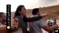 FILE - In this image from video, Noa Argamani reacts as she is seized by members of the Hamas militant group during an incursion into Israel on Oct. 7, 2023. Israel reported on June 8, 2024, that Aragamani was among four hostages rescued alive.