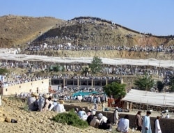 FILE - Tribesmen attend a religious congregation organized by Tablighi Jamaat in Miranshah, Pakistan, May 6, 2006. Militants fighting the Pakistani army in the region had distributed leaflets in the name of al-Qaida leader Osama bin Laden.