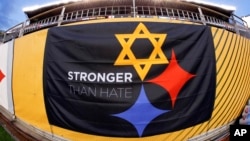 A "Stronger Than Hate" banner is displayed on the sidelines before an NFL Football game, Nov. 8, 2018, at Heinz Field in Pittsburgh. It's a memorial to the 11 people killed in a synagogue on Oct. 27, 2018.
